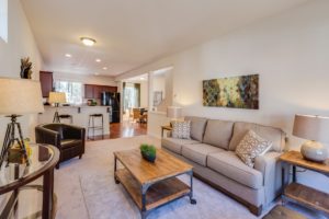 a living room with a couch and coffee table