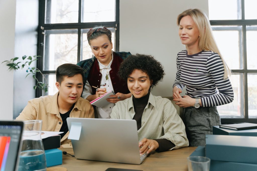 a group of people in a meeting