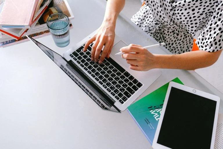 a woman working on a laptop