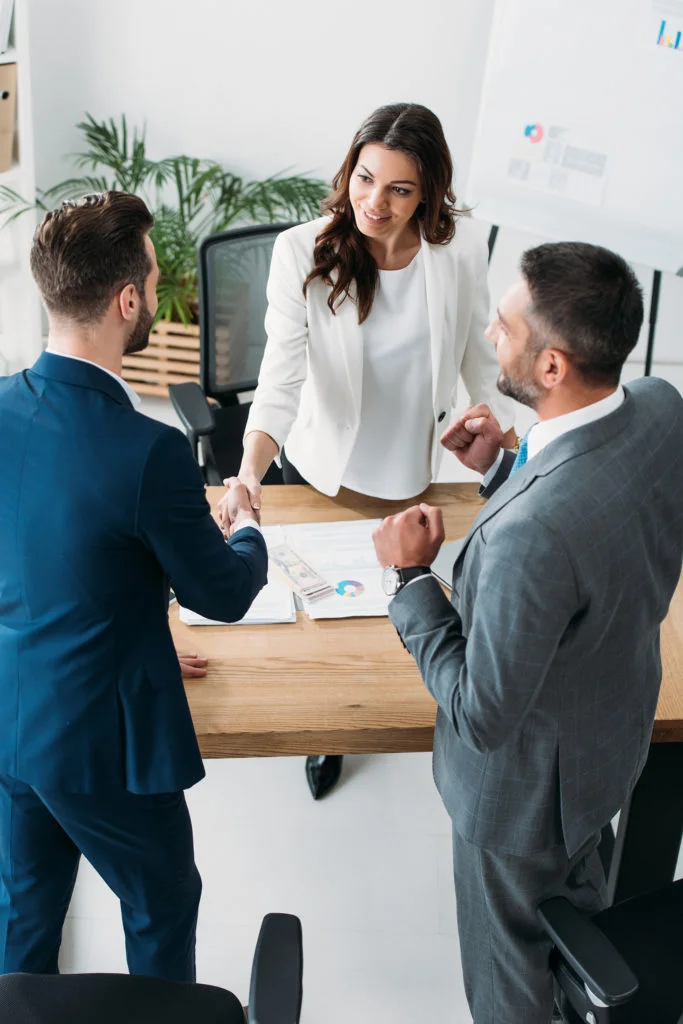 a man and a woman shaking hands