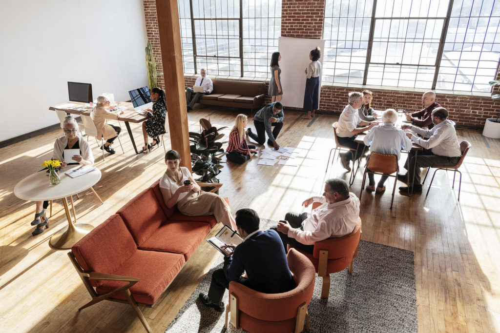 a group of people sitting in a room